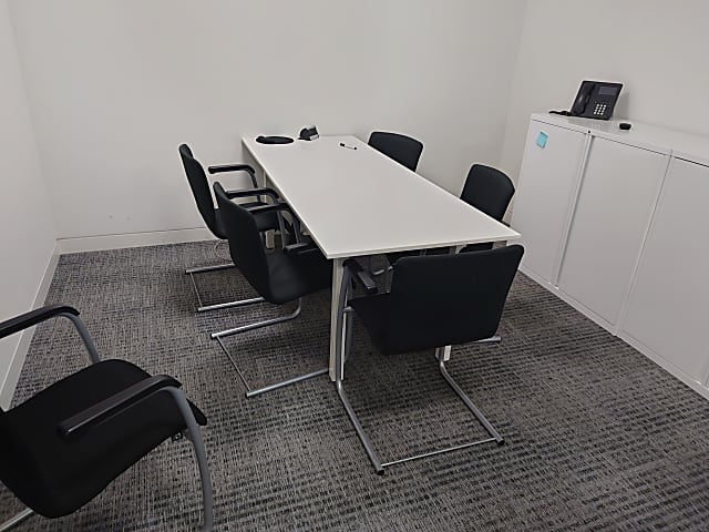 White thin meeting room table