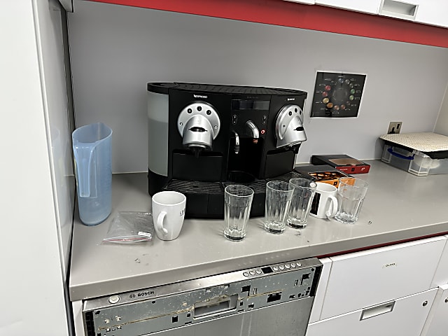 white and black coffee maker