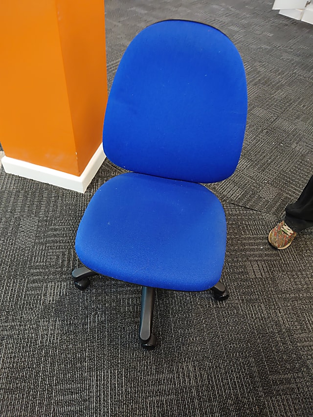 Blue operator chair no arm rests