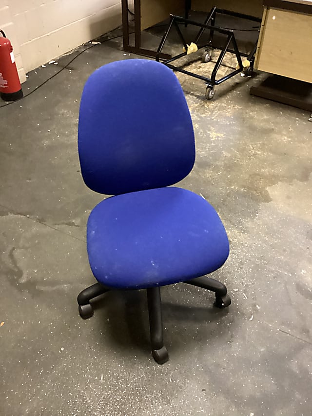 Blue black operator chair no arm rests