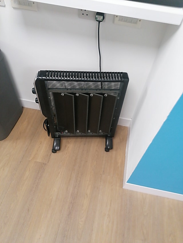 black and gray space heater