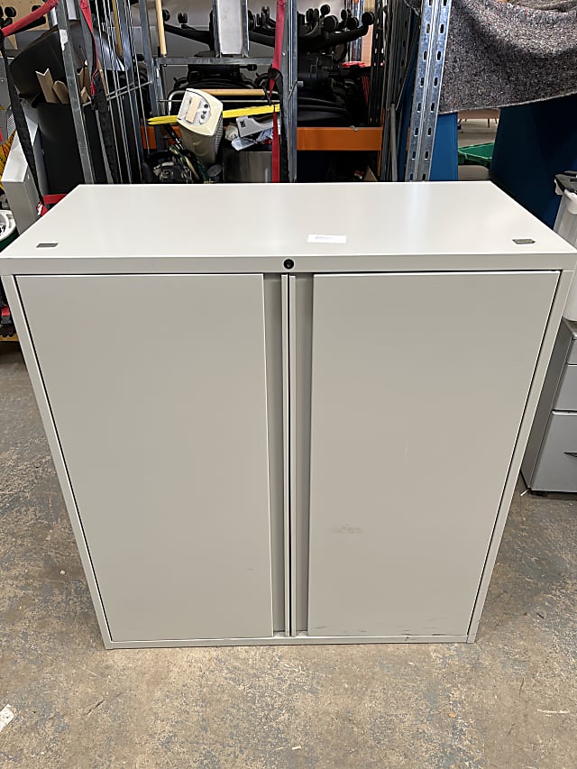 Metal storage cabinet with two shelves