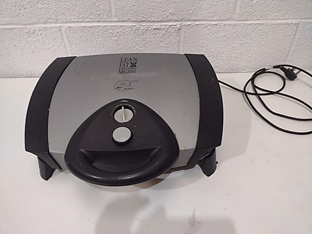 black and gray George Foreman Lean Mean Fat Grilling Machine