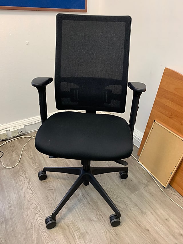 Black operator chair on wheels