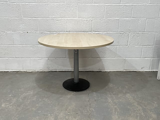 brown wooden table with black base