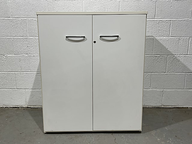 white wooden two door cabinet