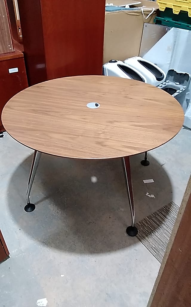 Round walnut meeting table  with cable tidy centre