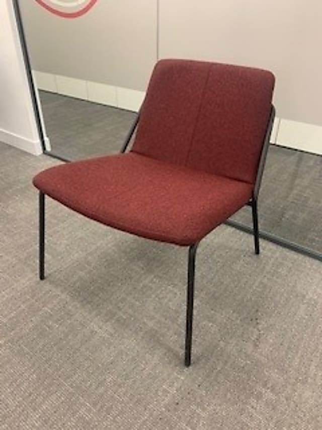 Red fabric covered chair