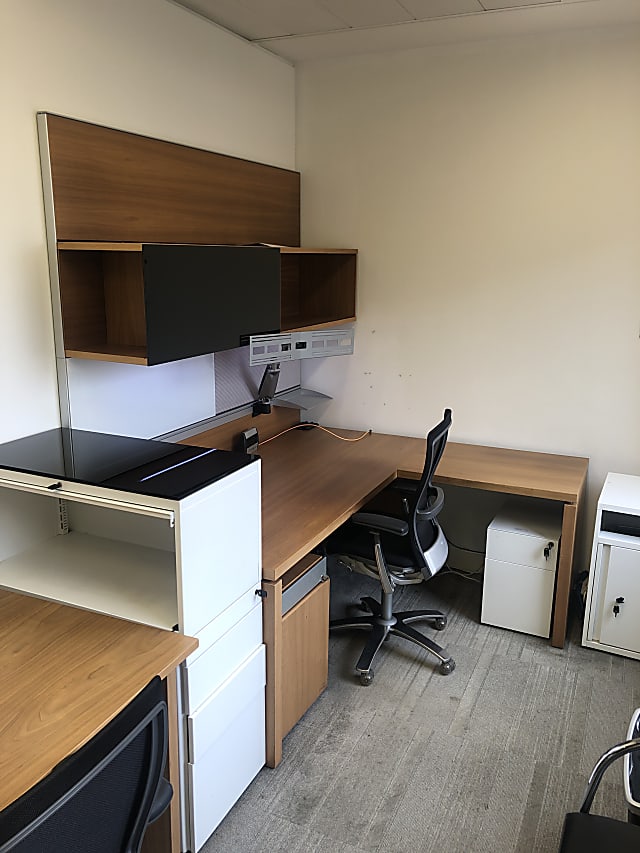 brown wooden desk with matching ped and shelves