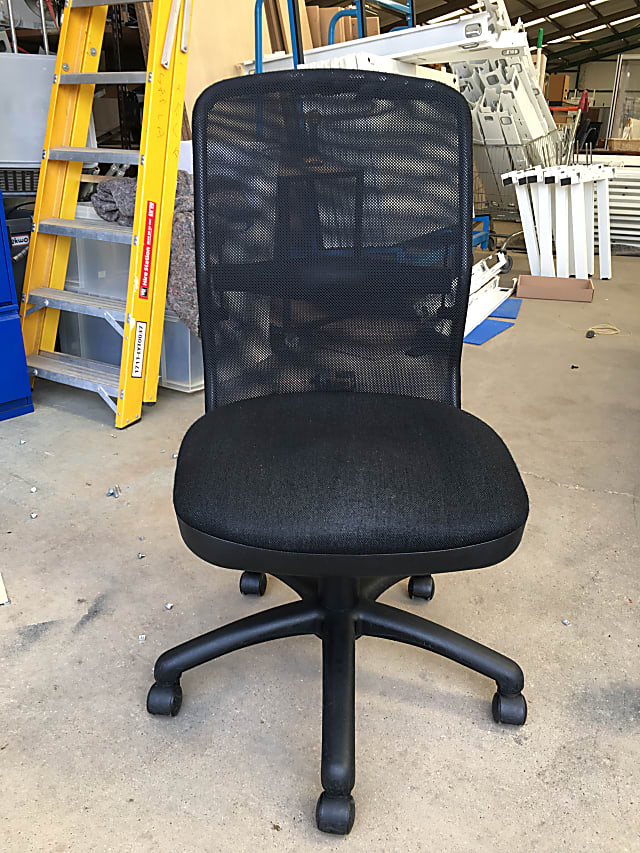 Black mesh back operator chair