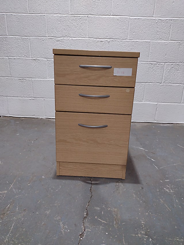 Three drawer wooden pedestal