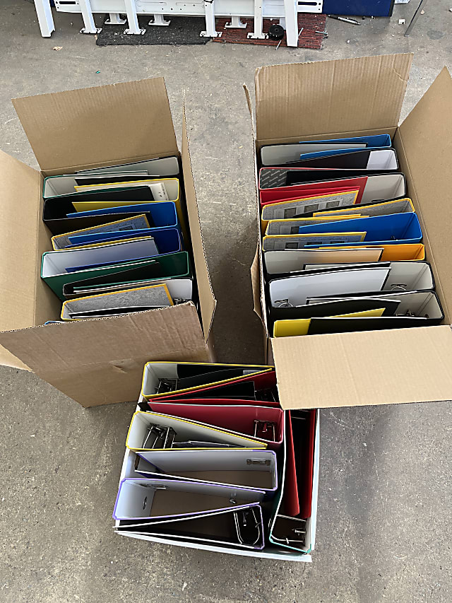 3 boxes of used files folders binders 