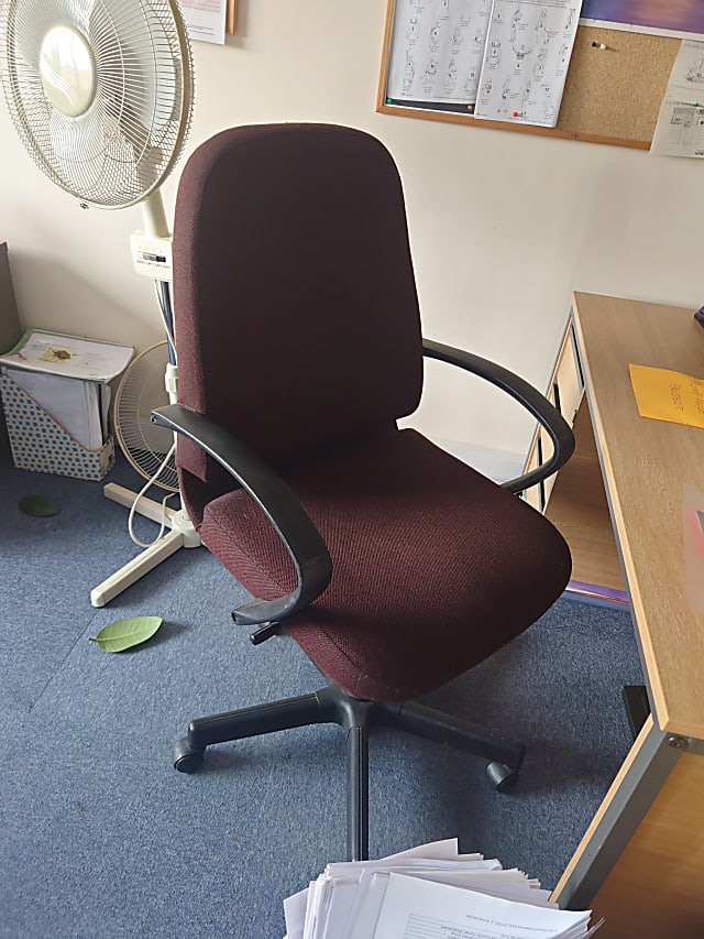 Brown operator chair 