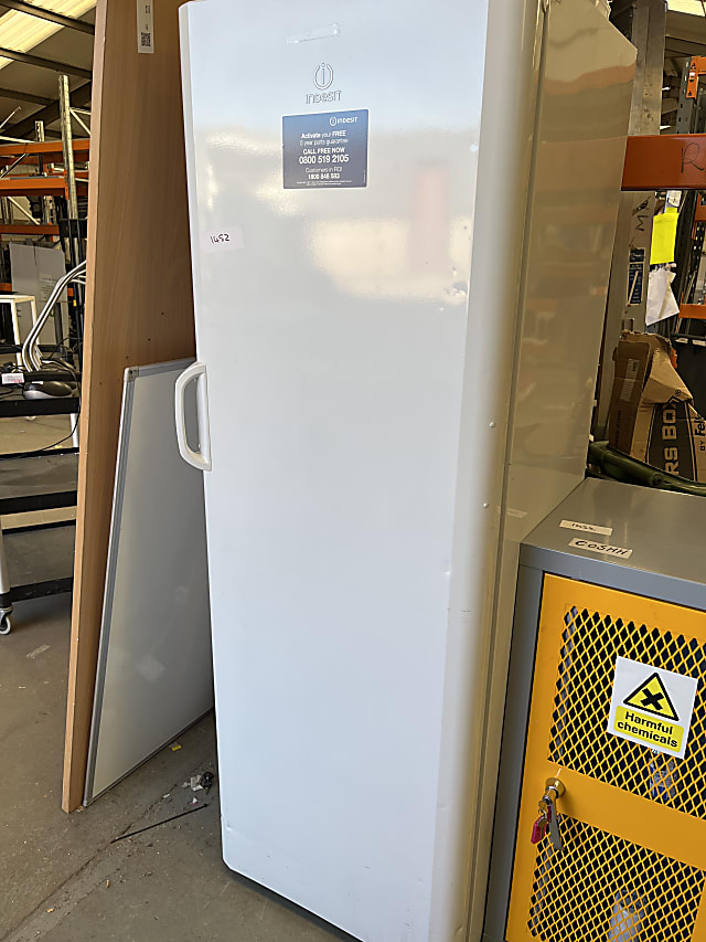 Tall Indesit fridge missing shelves 