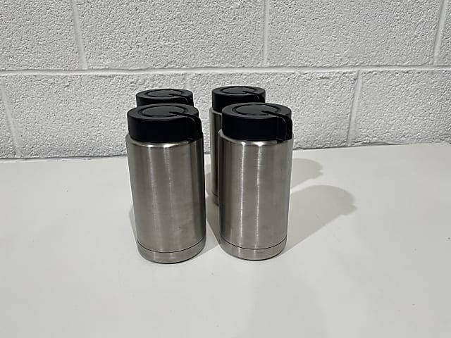 Four stainless steel pouring flasks