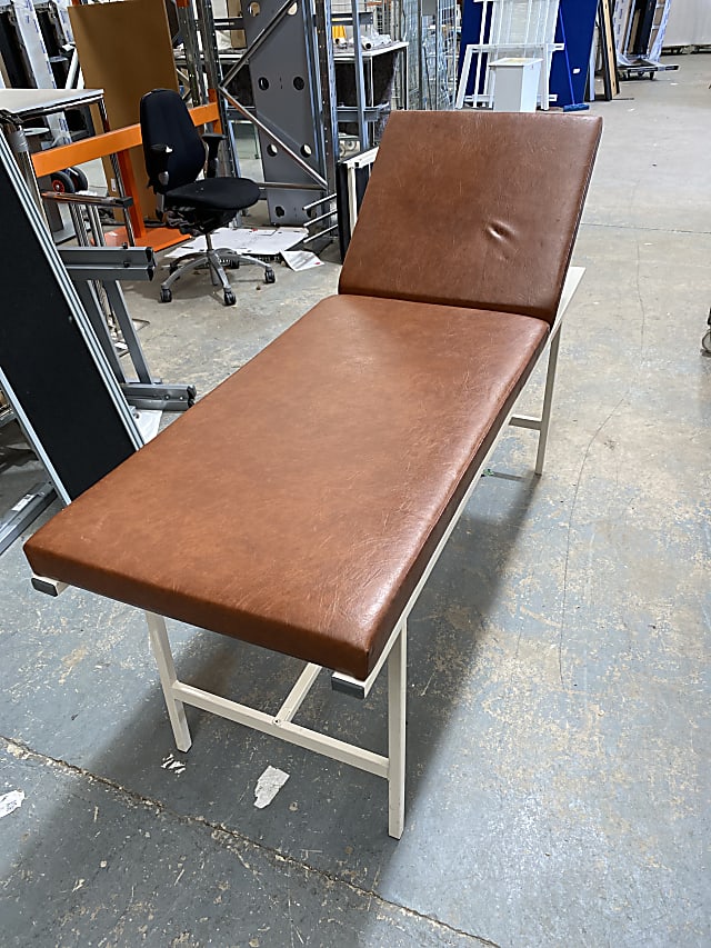 Brown leather medical bed