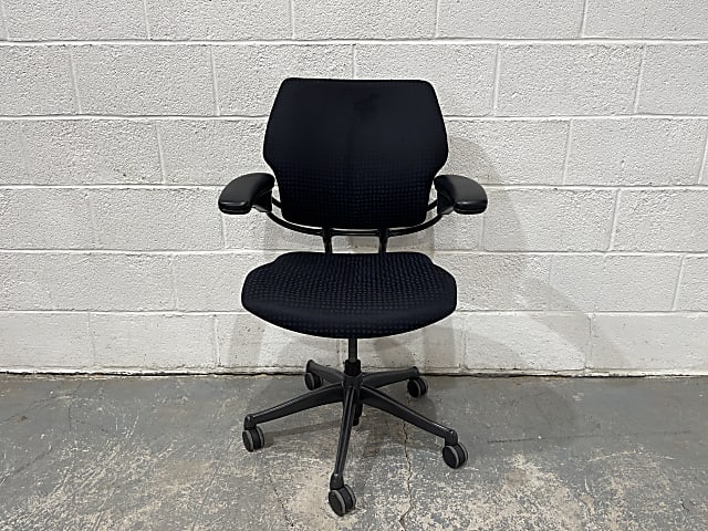 Blue Humanscale Freedom chair wear