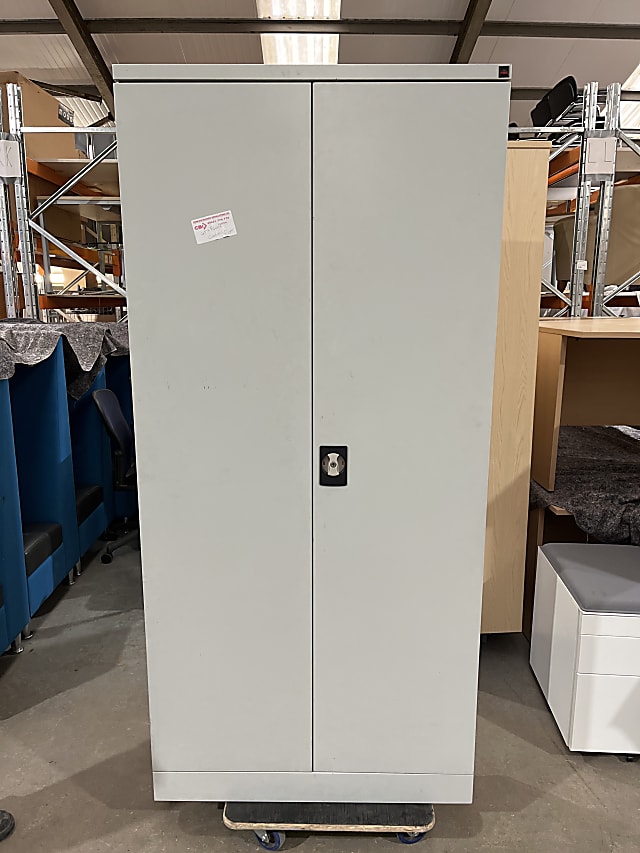 Tall metal storage cabinet with internal shelves