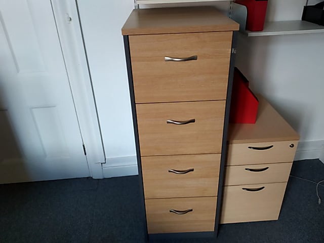 brown wooden 4-drawer filing cabinet