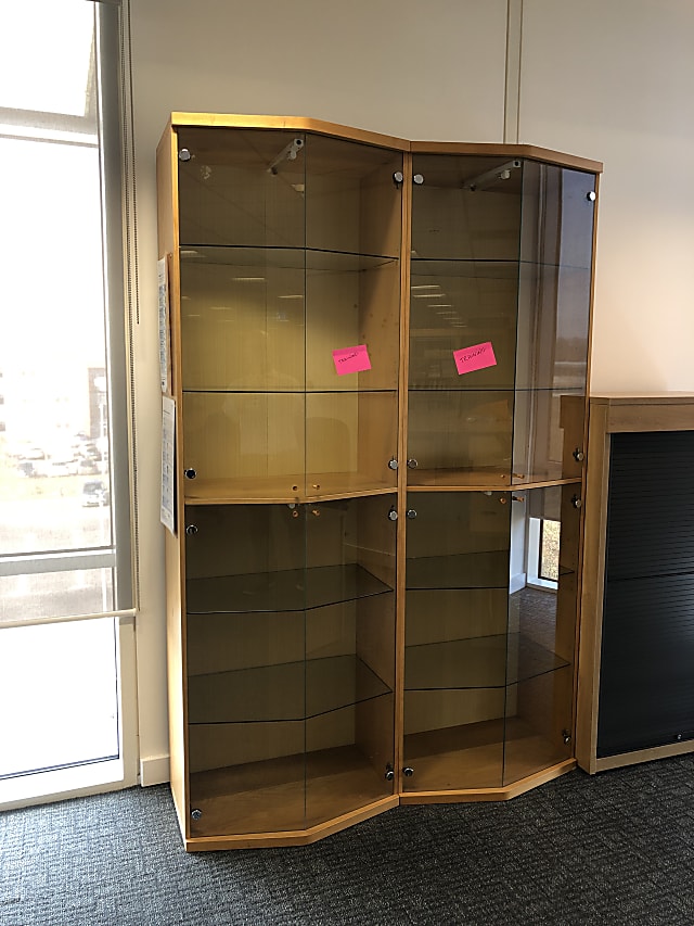 brown wooden framed glass display cabinet