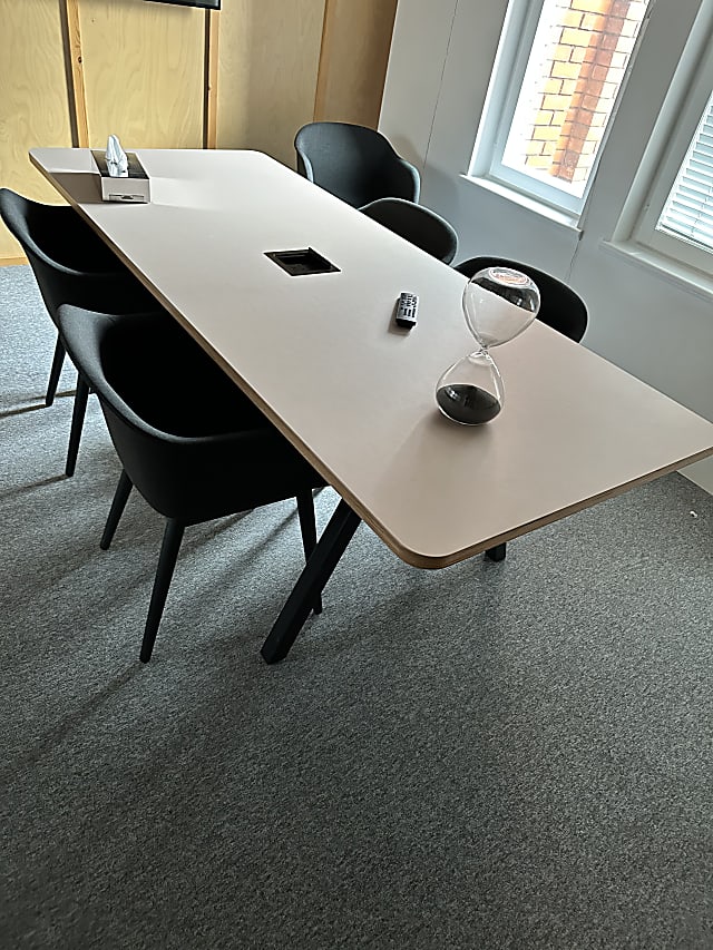 black and brown 2 metre meeting room table with desk power