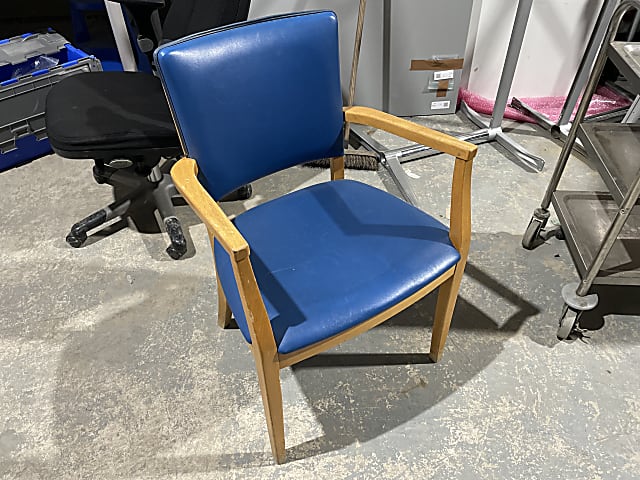 black and brown wooden armchair