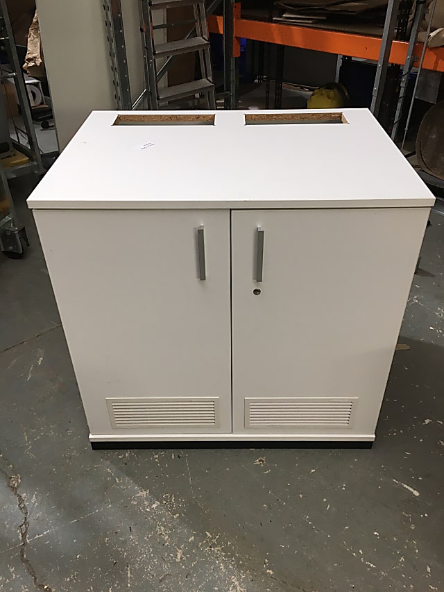 Media cabinet with access slots in top and ventilation in doors