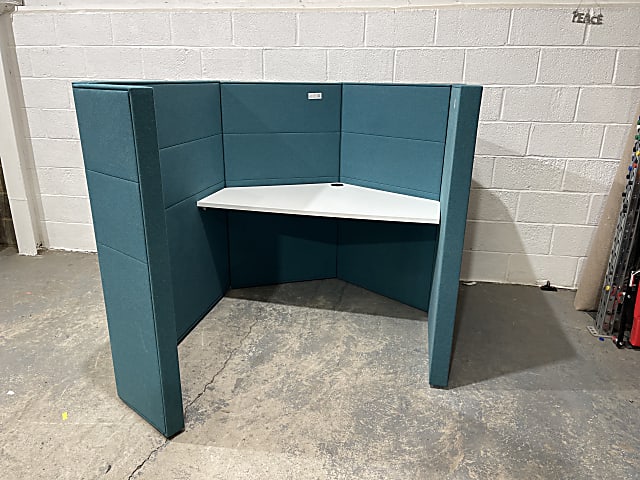 Blue privacy work booth with integrated table