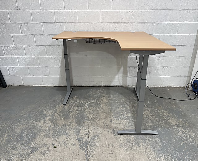 Right hand wave height adjustable desk