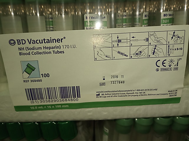 two white and green labeled boxes