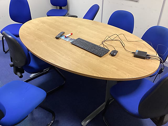 brown oval wooden table