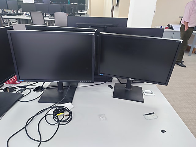 70 x monitors and work stations 