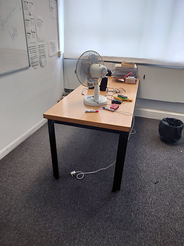 brown desk with brown straight legs