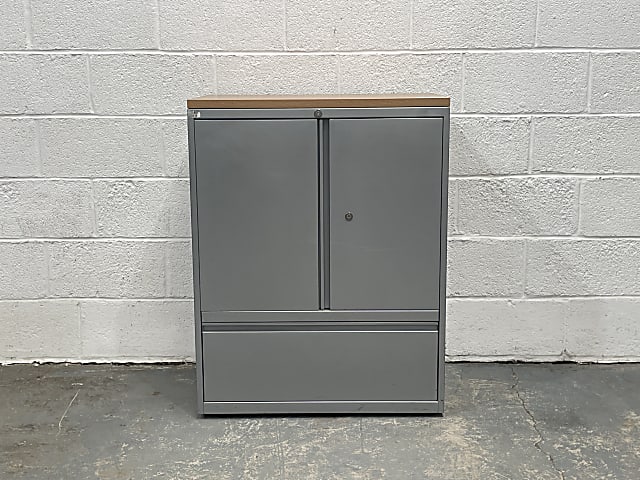 Small metal cabinet with bottom drawer