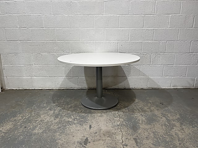 White round wooden table metal base