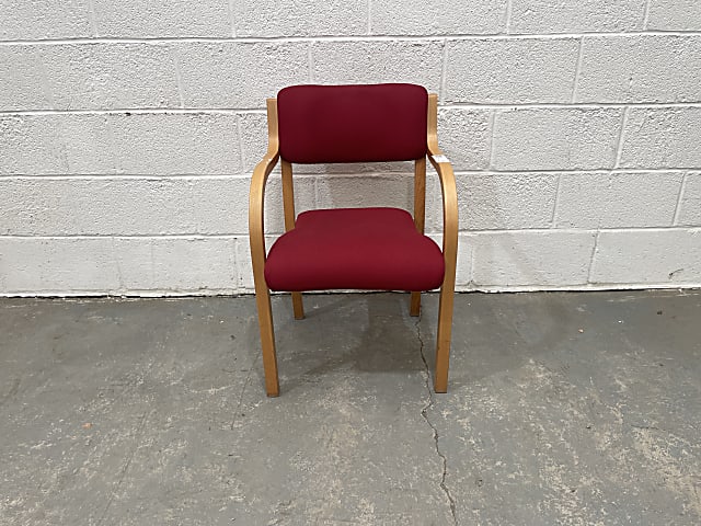 red fabric wooden chair