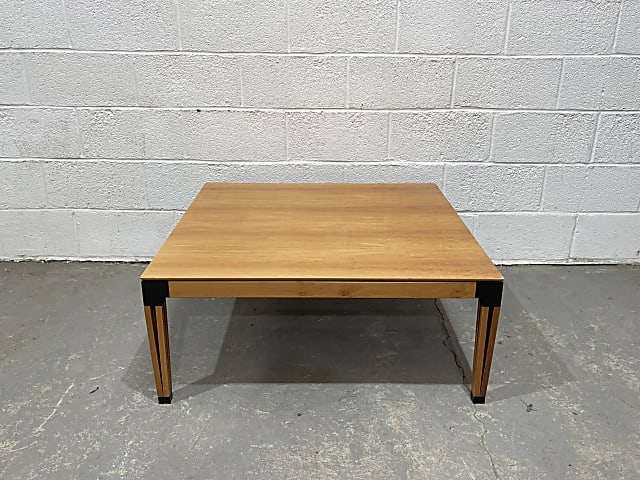 Square brown wooden coffee table