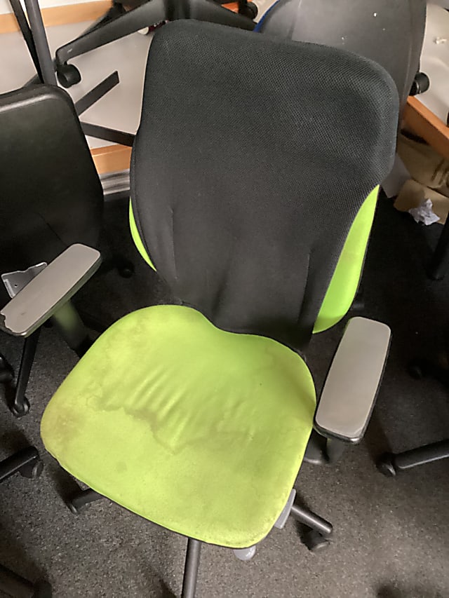 black and green rolling chair