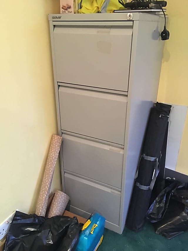 Four drawer metal filing cabinet