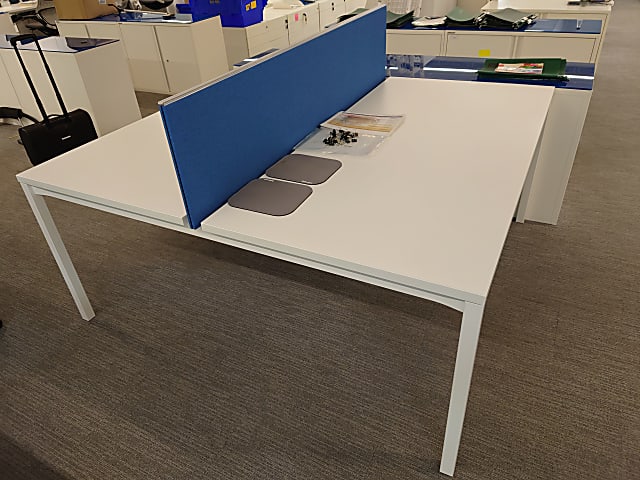 Bank of two desks with divider