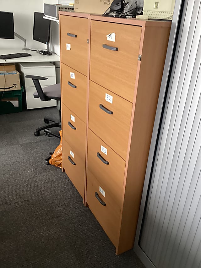 brown wooden 4-drawer filing cabinet