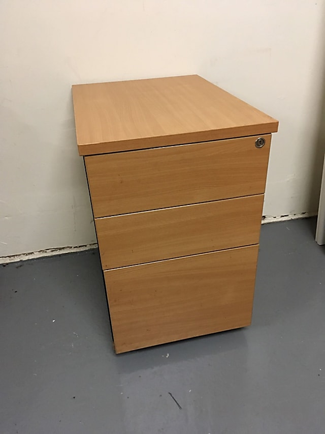 brown wooden 3-drawer pedestal