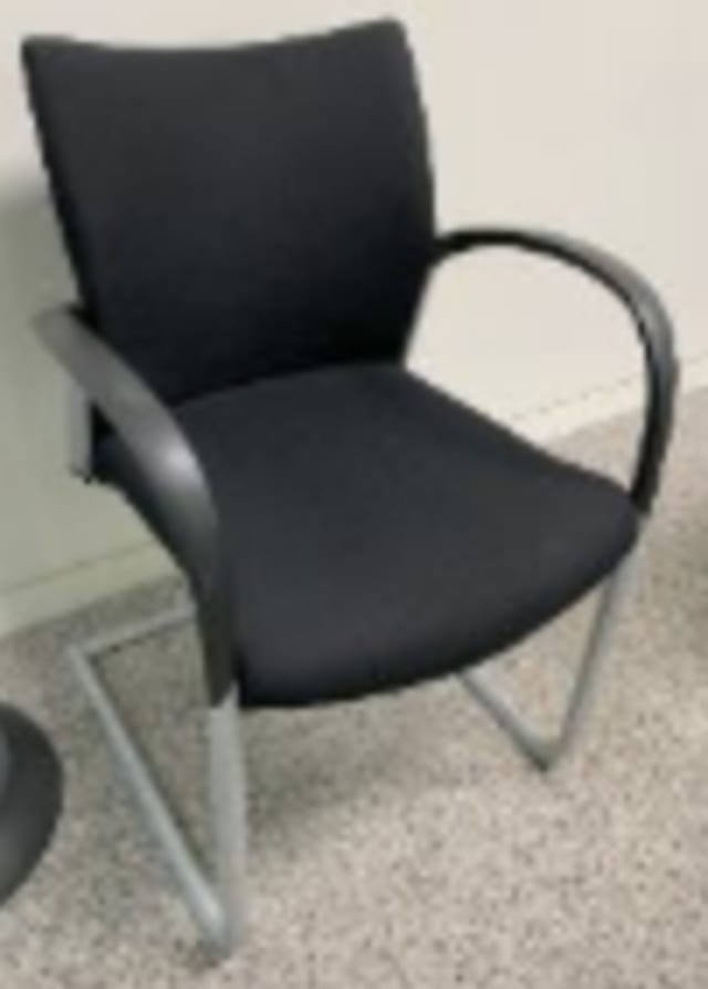 Generic black cantilever chair with square base, plastic arms