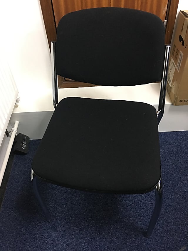 Black padded waiting room chair