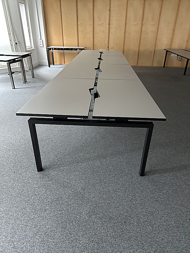 Bank of 8 desks white tops black steel frame staverton