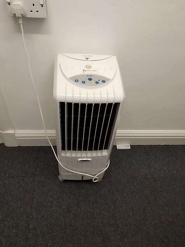 white portable cooler fan