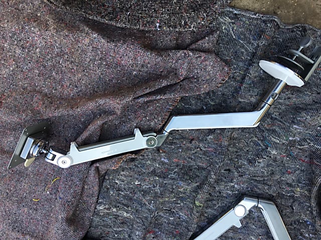 Human scale monitor arm