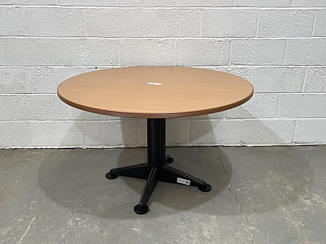 Round brown wooden  table