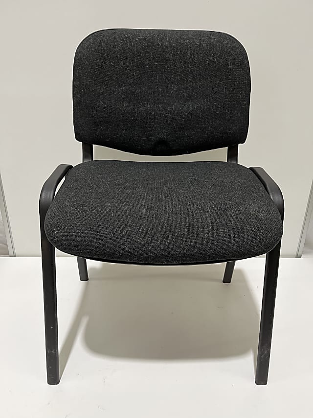 Grey padded stacking chair