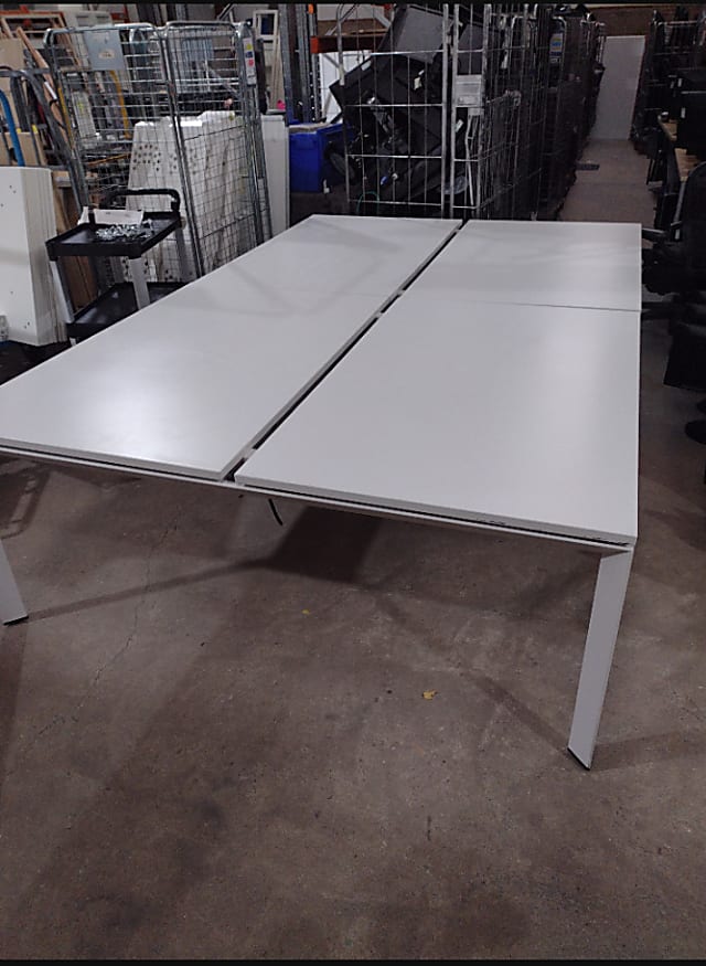 White slimline desks in bank bench or pod of 4